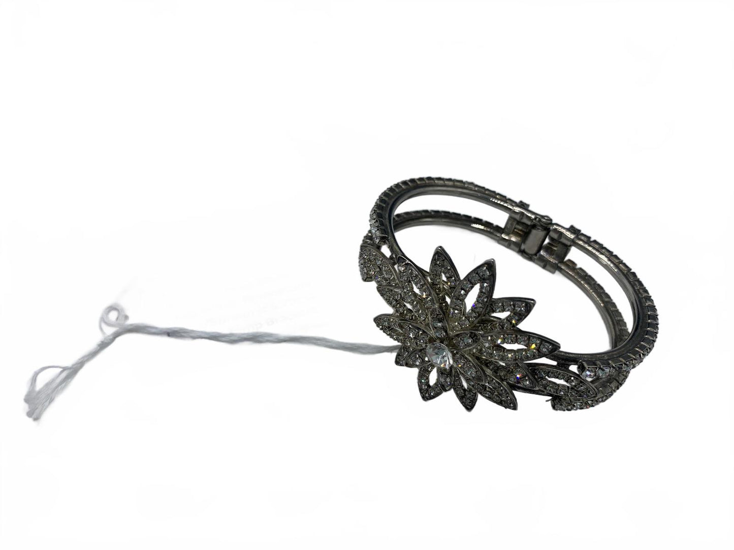 Unsigned Silvertone White Rhinestone Floral/Sunburst 6.75" Hinged Clamp Bracelet